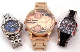 Three cased late 20th/early 21st century designer type quartz movement wrist watches including an