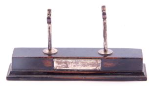 Ebonised and silver pen holder, rectangular step ebonised base with two silver rowlocks and engraved