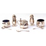 George V five piece silver cruet set of panel design to include a lidded hinged mustard and liner,