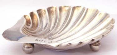 George V silver shell butter dish, hallmarked Birmingham 1920, makers marked rubbed, standing on