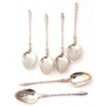 Six Continental white metal tea spoons with twist stems and hoof finials, 38.7gms