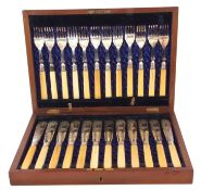 Cased set of twelve Victorian silver plated fish knives and forks, the knives engraved with a