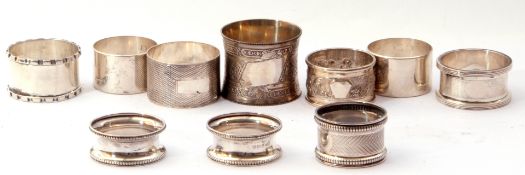 Mixed Lot: Eight various hallmarked silver serviette rings, various dates and makers, together