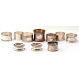 Mixed Lot: Eight various hallmarked silver serviette rings, various dates and makers, together