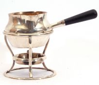 George V silver brandy saucepan warmer on burner stand, having a plain round baluster body, a