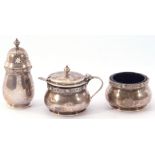 George VI three-piece silver condiment set, of baluster form, the rims with embossed and engraved