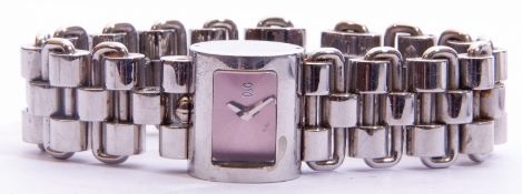 Ladies cased Dolce & Gabbana steel cased drum wrist watch on heavy steel bracelet with instruction
