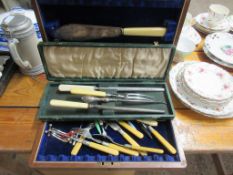 CASED CARVING SET TOGETHER WITH A MAHOGANY CANTEEN CONTAINING BONE HANDLED FISH CUTLERY