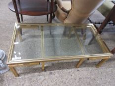 NESTING PAIR OF BRASS FRAMED GLASS TOPPED COFFEE TABLES, WIDTH OF LARGEST APPROX 106CM