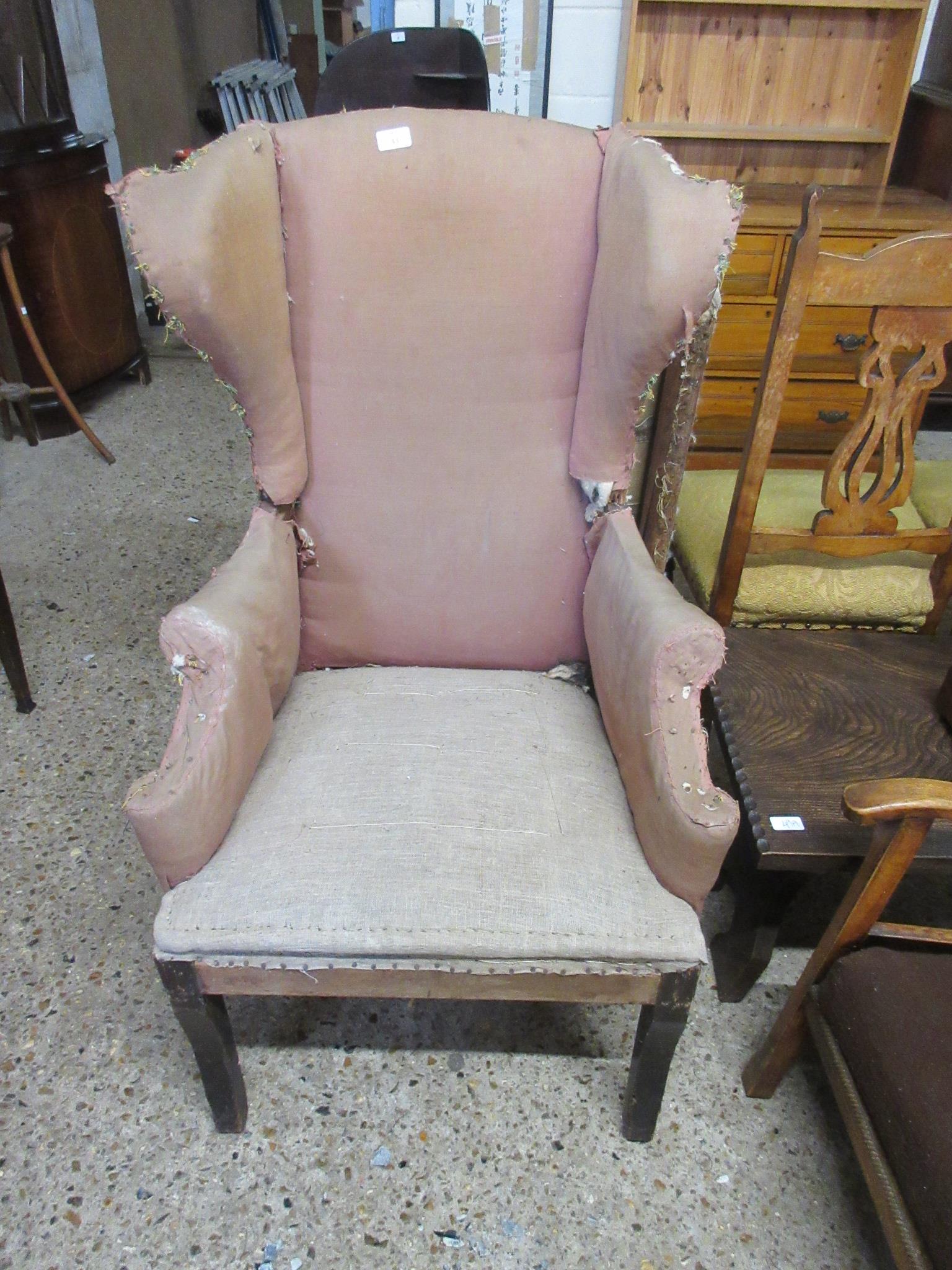 19TH CENTURY FIRESIDE UPHOLSTERED CHAIR (A/F) HEIGHT APPROX 105CM