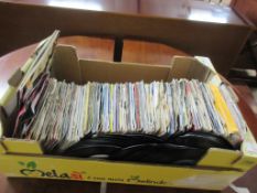 BOX CONTAINING A LARGE QUANTITY OF MOSTLY 7 INCH SINGLE RECORDS, APPEAR MOSTLY 1980S WITH SOME EARLY