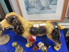 LARGE FIGURE OF A SPANIEL, HEIGHT APPROX 38CM TOGETHER WITH TWO SMALLER DOG FIGURES AND A CARNIVAL