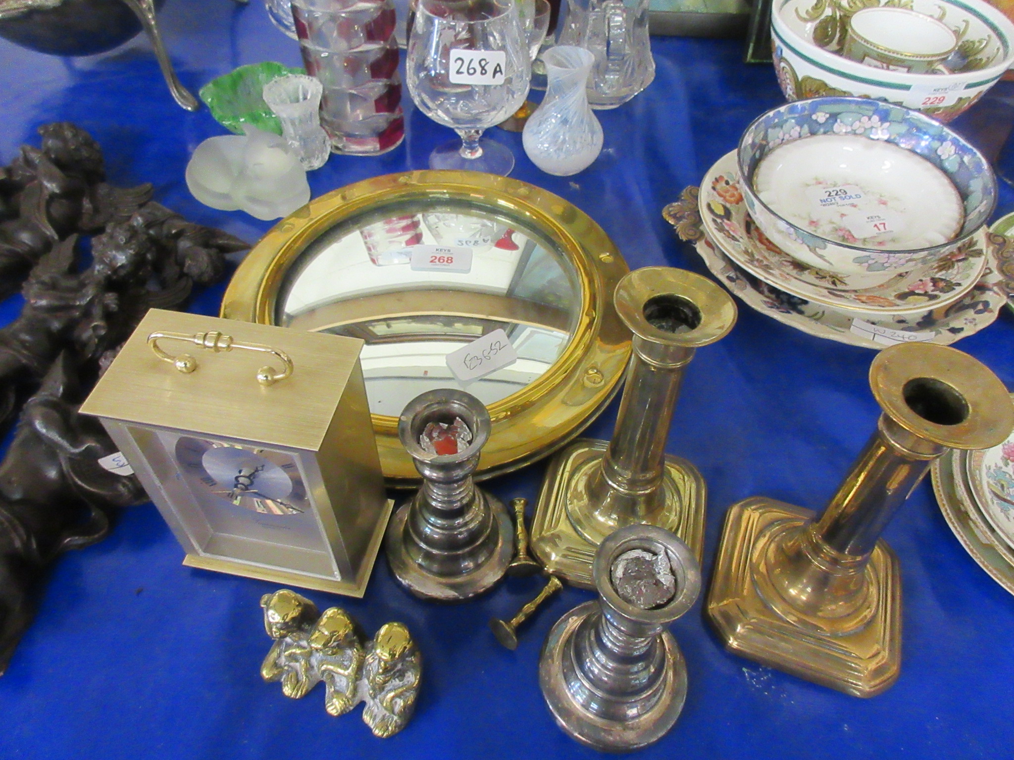BRASS FRAMED CIRCULAR MIRROR, WIDTH APPROX 26CM TOGETHER WITH VARIOUS CANDLESTICKS, CARRIAGE CLOCK