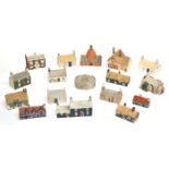 Collection of small Goss cottages including Manx cottage, model of an oven in which Goss porcelain