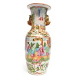 Chinese Canton vase decorated in famille rose with typical decoration and relief moulded