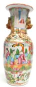 Chinese Canton vase decorated in famille rose with typical decoration and relief moulded