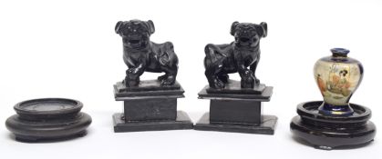 Pair of Chinese carved wooden lions on rectangular bases, together with a miniature Satsuma vase, (