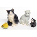 Royal Doulton model of a cat together with a small yellow bird, further novelty cat and a white