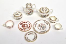 Miniature Wedgwood tea set in the Asiatic pheasant pattern, comprising tea pot, coffee pot, sugar