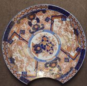 19th century Japanese porcelain charger of very large proportions, decorated in Imari style, 62cm