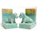 Pair of Art Deco pottery bookends both shaped with terriers seated on books