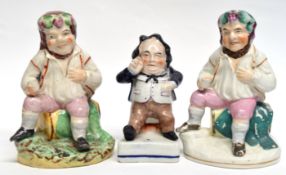 Three 19th century figures of topers mounted on green bases