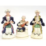 Group of Staffordshire porcelaneous figures, one as a pen holder, all modelled as Middle Eastern