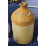 Large stoneware flagon produced by Doulton & Watts, impressed W Sherringham, Fakenham 1007, 45cm