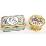 Two Halcyon Days enamel boxes in original packaging, one with a quotation from Voltaire, the