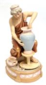 Mid-20th century Royal Dux figure of a potter modelled as a Grecian lady at a potting wheel on