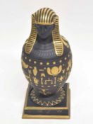 Wedgwood model of an Egyptian mummy, the black basalt ground decorated in gilt with various Egyptian