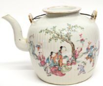 Large Chinese porcelain kettle decorated in polychrome with Chinese characters on a ribbed body,