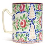 Chinese porcelain tankard with interlaced handles decorated in polychrome with floral sprays