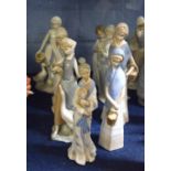 Group of Continental porcelain models of children decorated in Lladro style (qty)