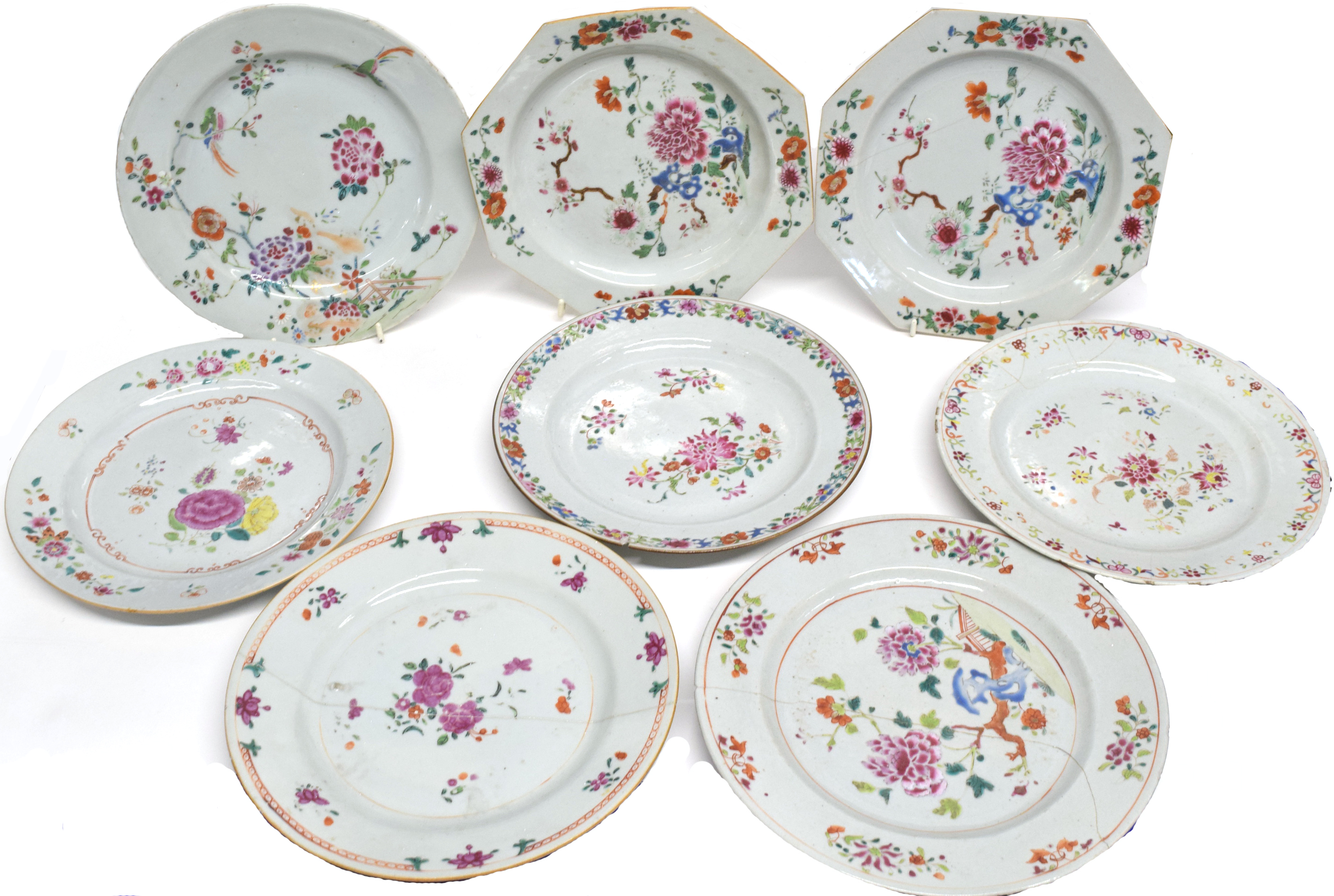 Eight 18th century Chinese porcelain plates all decorated in polychrome enamels, two octagonal