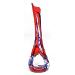 Tall Art Glass Murano type vase, the red ground decorated in relief with a blue swirling design,