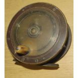 Vintage brass fishing reel, 11cm diam