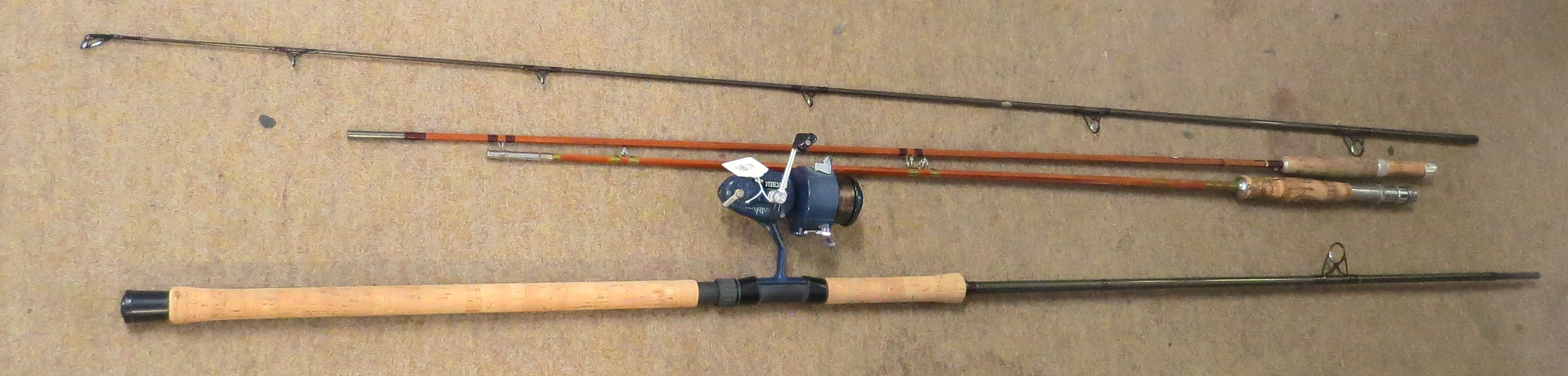 Two vintage fishing rods with a Mitchell 440A match reel