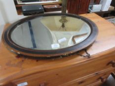 OVAL OVERMANTLE MIRROR IN CROSS BANDED WOODEN FRAME APPROX 59CM LONG