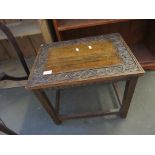 SMALL JOINTED TABLE WITH CARVED DECORATION THROUGHOUT, APPROX 58CM X 35CM