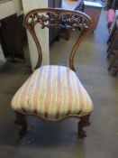 HEAVILY CARVED UPHOLSTERED CHAIR, HEIGHT APPROX 76CM