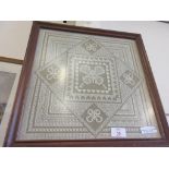 FRAMED DECORATIVE NEEDLEPOINT, GEOMETRIC PATTERN SURROUNDING A CENTRAL PANEL DEPICTING A