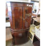 REPRODUCTION CORNER DRINKS CABINET WITH STRUNG DECORATION TO DOORS, APPROX 66CM WIDE