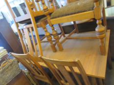 DINING TABLE TOGETHER WITH A SET OF FIVE CHAIRS