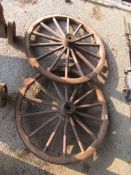 PAIR OF METAL RIMMED WOODEN CART WHEELS EACH DIAMETER APPROX 77CM