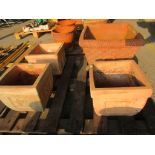 FOUR VARIOUS MOULDED SQUARE TERRACOTTA PLANTERS LARGEST APPROX 47CMSQ