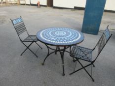 MOSAIC DECORATED VINTAGE METAL PATIO TABLE APPROX 90CM DIAMETER TOGETHER WITH TWO MATCHING FOLDING