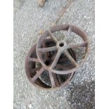 QTY OF CAST IRON SMALL WHEELS LARGEST APPROX 26CM DIAMETER