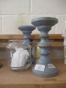 TWO PAINTED WOODEN CANDLE STICKS TOGETHER WITH TWO GLASS CANDLE HOLDERS