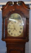 Early 19th century oak longcase clock, swan neck pediment over a painted arched dial by Robert